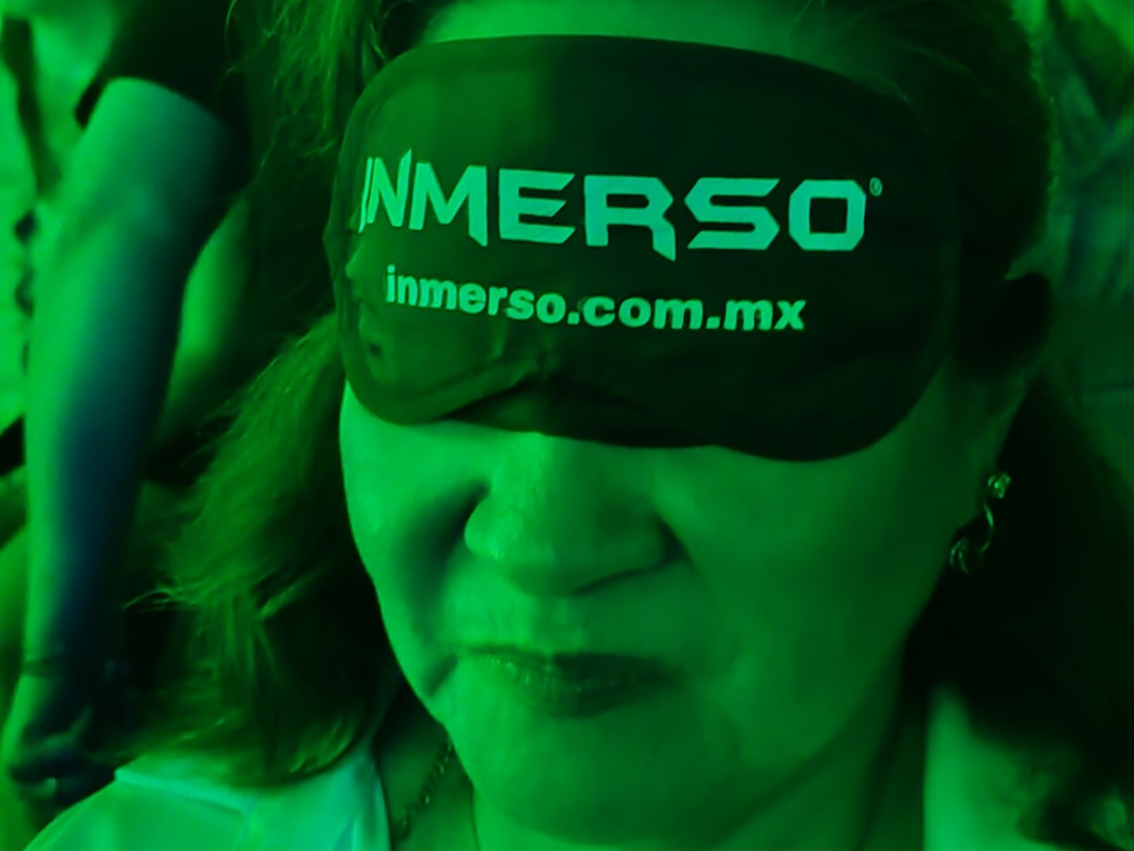 INMERSO Espectáculos – asistente sonriendo durante la función